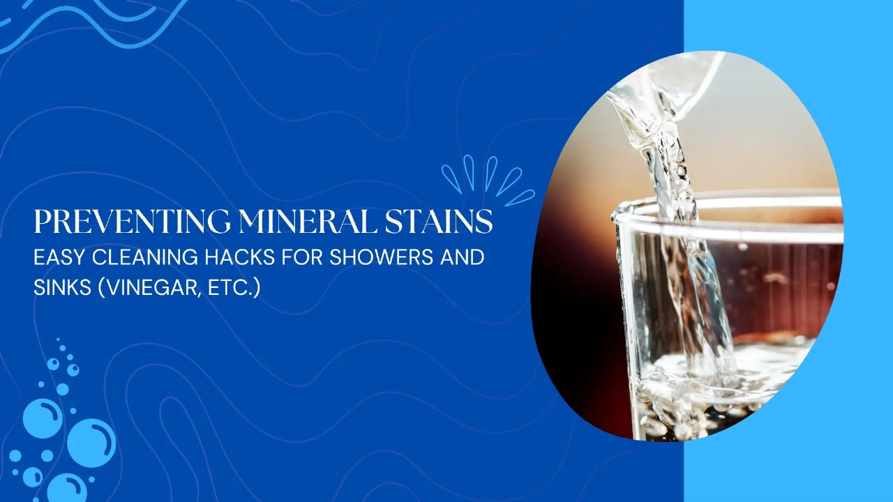 Informative blog or guide banner titled "Preventing Mineral Stains: Easy Cleaning Hacks for Showers and Sinks (Vinegar, Etc.)". The left half of the design features bold white text on a deep blue background with subtle wave and bubble illustrations, evoking water flow and mineral buildup. The right side showcases a high-resolution close-up of clear water being poured from a glass pitcher into a transparent drinking glass, with natural reflections and light distortions highlighting the clarity of the water. The warm background tone contrasts with the cool blue color scheme, suggesting a home kitchen or bathroom environment. The composition visually supports the theme of mineral stain prevention and simple cleaning techniques, emphasizing the role of clean water and household solutions like vinegar in maintaining surfaces free from buildup.